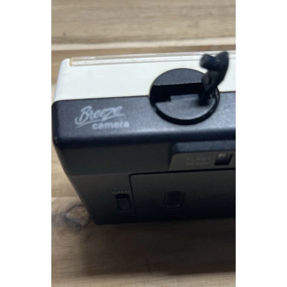 Kodak White Breeze Point-and-Shoot Camera with Black Strap and Pink Accents